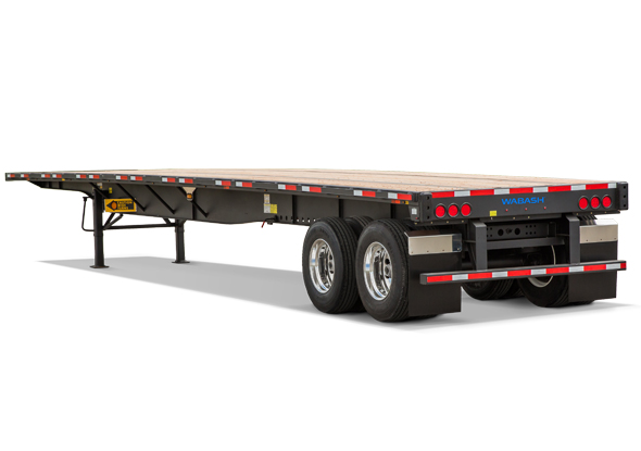 Flatbed trailer transport solution for heavy equipment