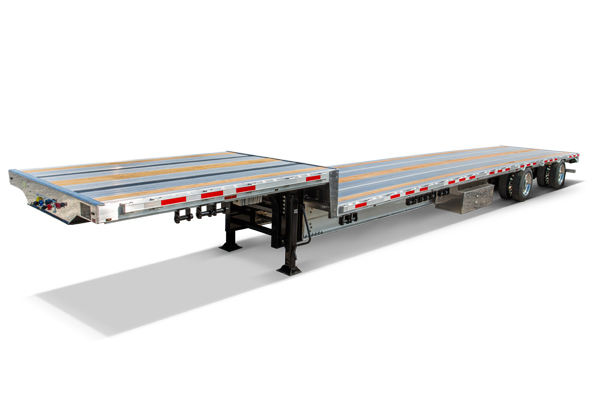 Step deck (drop deck/lowboy style) trailer hauling construction equipment